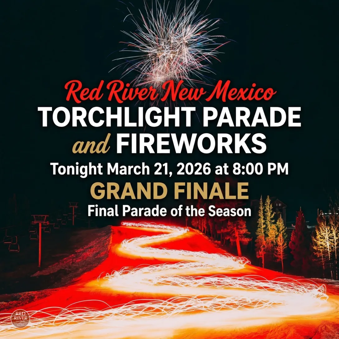 A promotional poster for the Red River New Mexico Torchlight Parade and Fireworks featuring a nighttime scene of a ski slope. In the foreground, long-exposure light trails from skiers carrying torches create a glowing, winding orange path down the snow-covered mountain. Above the slope, a large white and gold firework burst fills the dark sky.  The text on the image reads: "Red River New Mexico TORCHLIGHT PARADE and FIREWORKS. Tonight March 21, 2026 at 8:00 PM. GRAND FINALE: Final Parade of the Season."